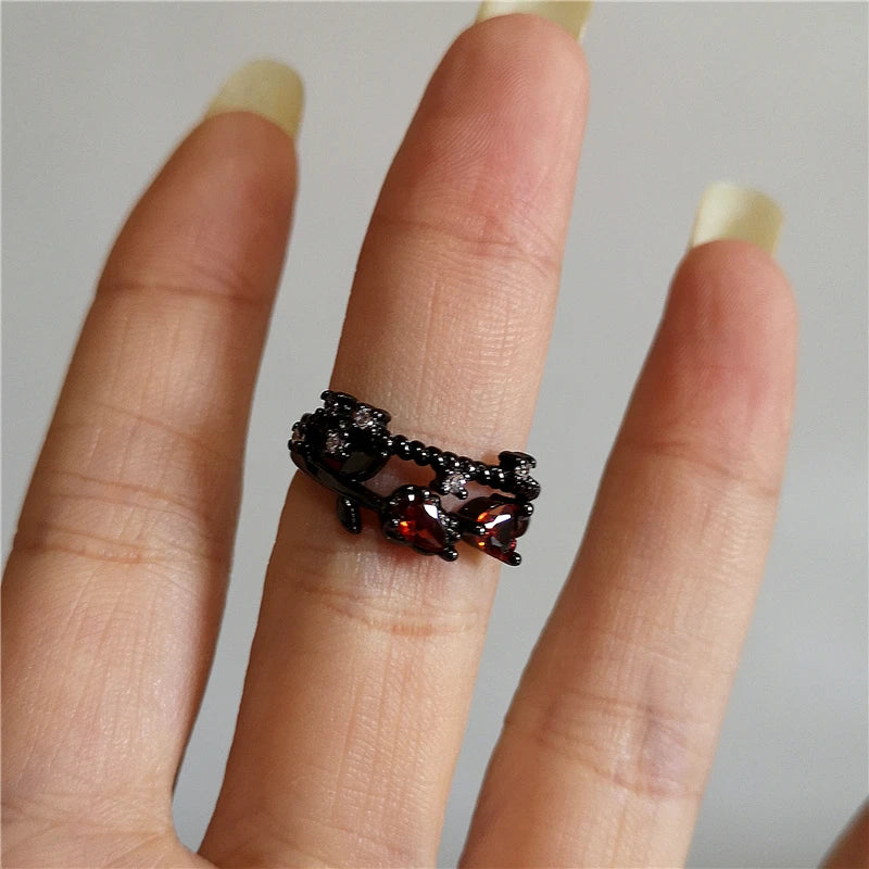Thorn‑Kissed Rose Chaos Ring