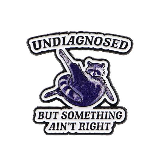 Something Ain’t Right Raccoon Enamel Pin